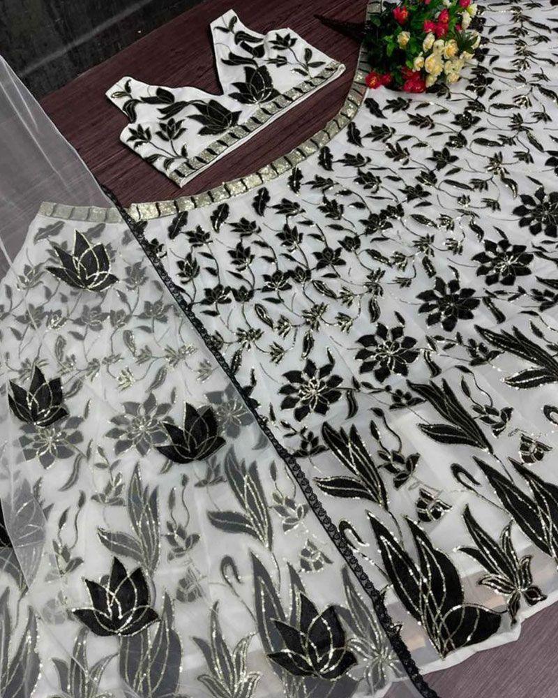 Lehenga choli in metallic colors, Tie-dye Lehenga choli, Lehenga choli with cutwork, Lehenga choli for kitty party, Lehenga choli with 3D flowers, Lehenga choli in ivory color, Lehenga choli for photoshoot, Lehenga choli with ombre effect, Detachable Lehenga choli skirt, Lehenga choli for beach wedding, Lehenga choli in bright colors