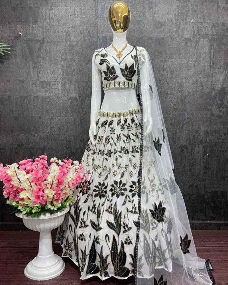 Lehenga choli in metallic colors, Tie-dye Lehenga choli, Lehenga choli with cutwork, Lehenga choli for kitty party, Lehenga choli with 3D flowers, Lehenga choli in ivory color, Lehenga choli for photoshoot, Lehenga choli with ombre effect, Detachable Lehenga choli skirt, Lehenga choli for beach wedding, Lehenga choli in bright colors