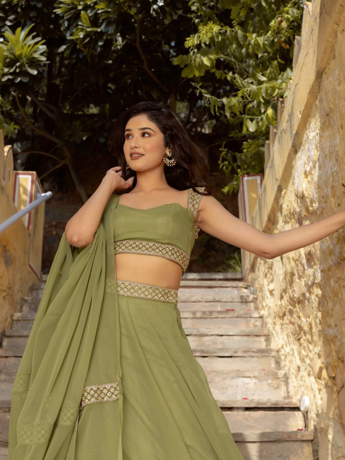 Buy elegant faux georgette lehenga for women featuring umbrella cut design, soft crepe lining and designer dupatta. Ideal for weddings & festive occasions.