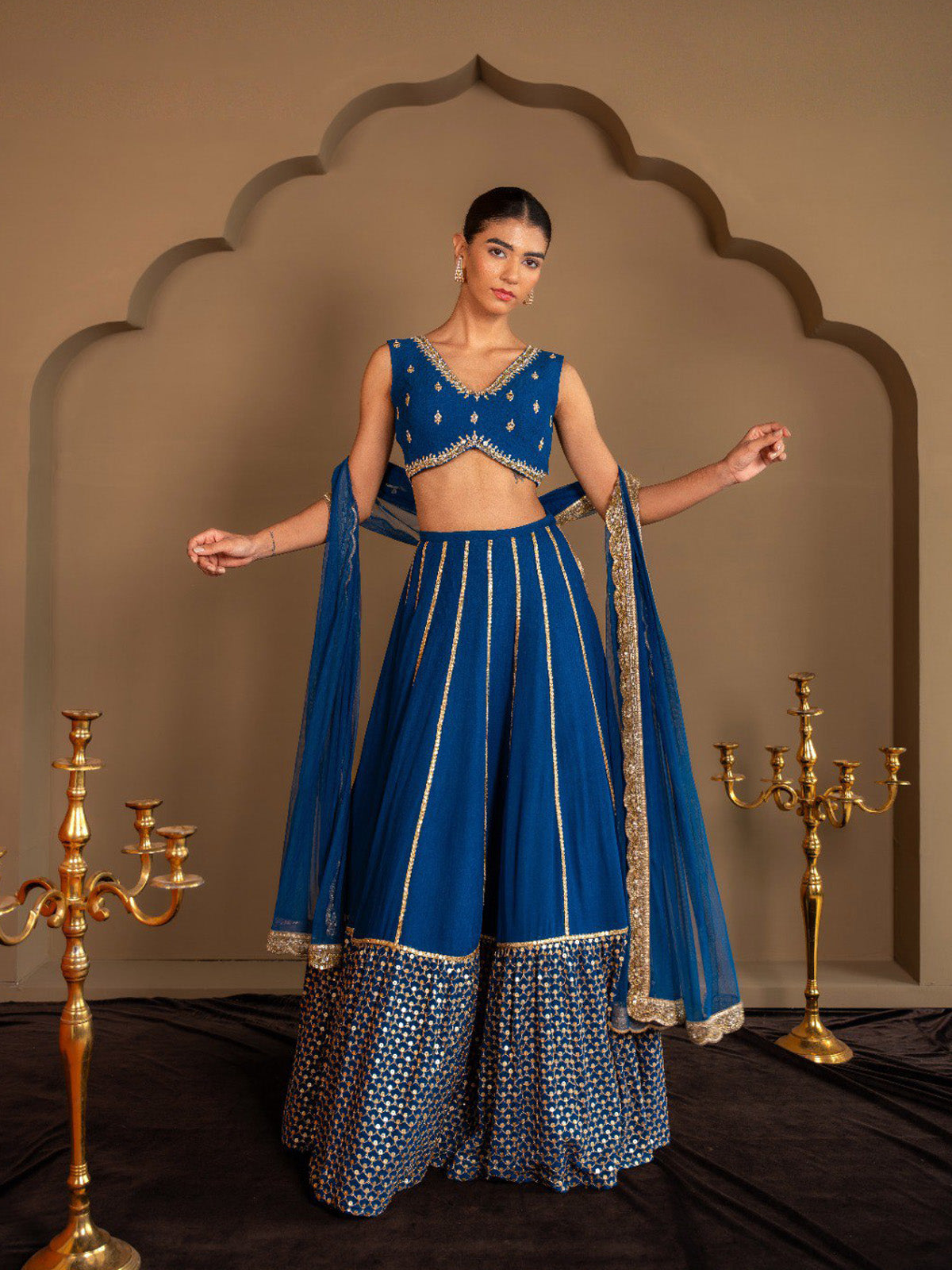 Discover FEALDEAL wedding lehenga choli featuring sequins, zari embroidery, paper mirror work and premium faux georgette fabric. Shop online today.