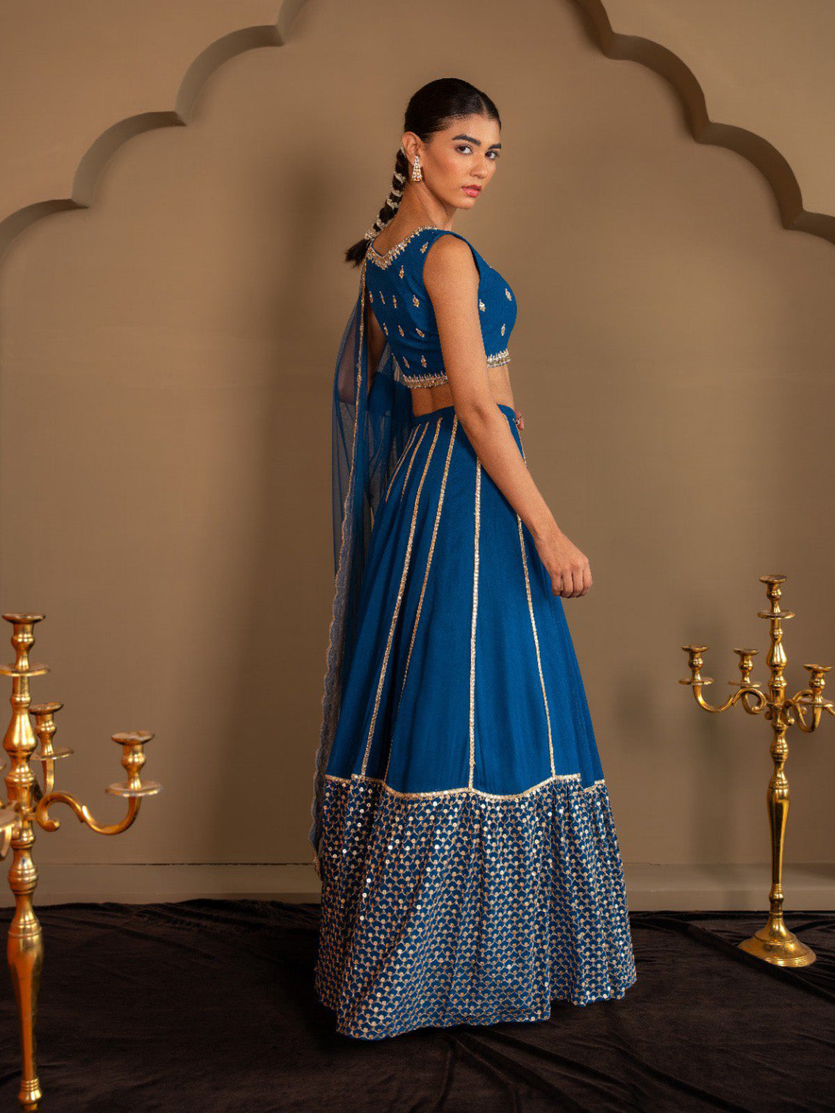 Premium sequin lehenga choli for women with paper mirror embroidery, zari work and faux georgette dupatta. Ideal for receptions, engagements and festivals.