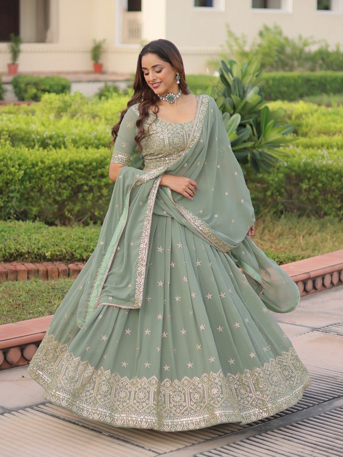 Buy premium faux georgette lehenga with embroidered blouse, elegant zari work and stitched dupatta. Perfect for weddings, receptions and festive occasions.