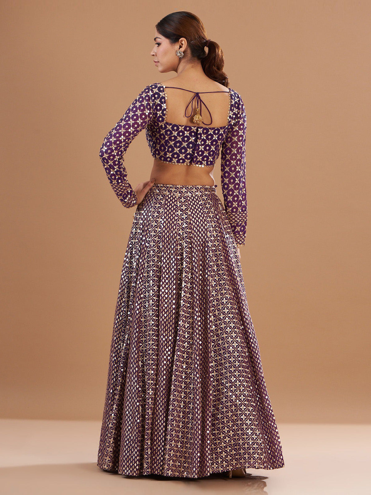 Discover FEALDEAL wedding lehenga choli with 9MM sequins, zari embroidery, cancan flare and faux georgette dupatta. Shop designer ethnic wear online.