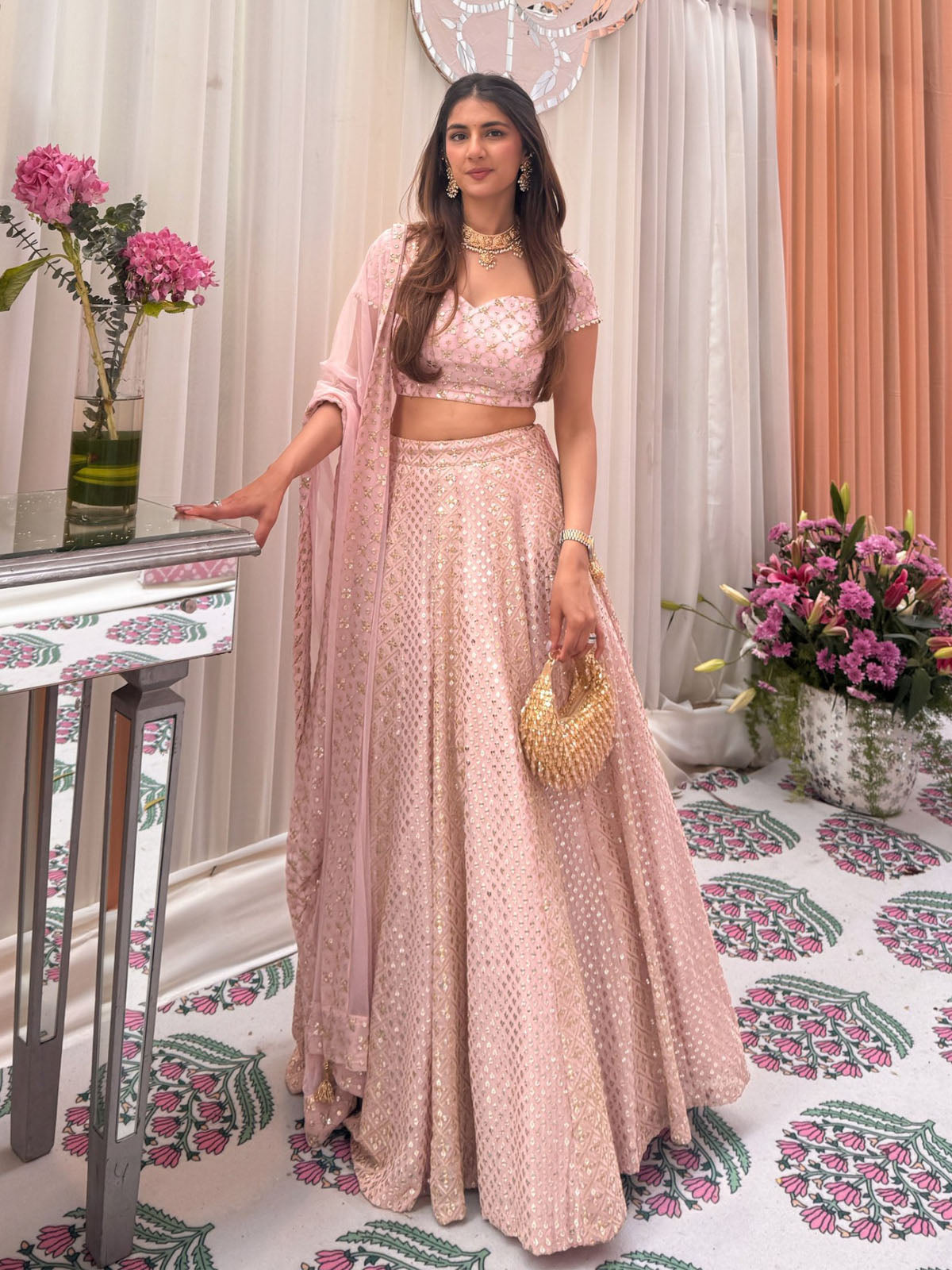 Premium pink sequin lehenga choli with faux georgette fabric, embroidered blouse and designer dupatta. Ideal for engagements, parties, weddings and festive celebrations.