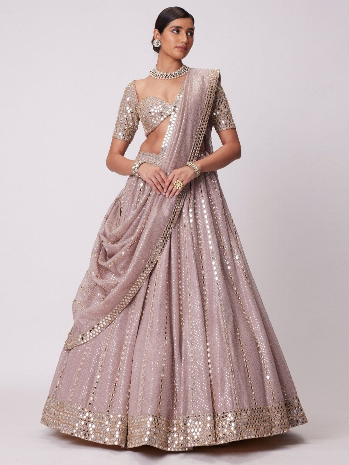 Buy premium mauve lehenga for women featuring semi viscose organza fabric, zari embroidery, paper mirror work and elegant wedding dupatta.
