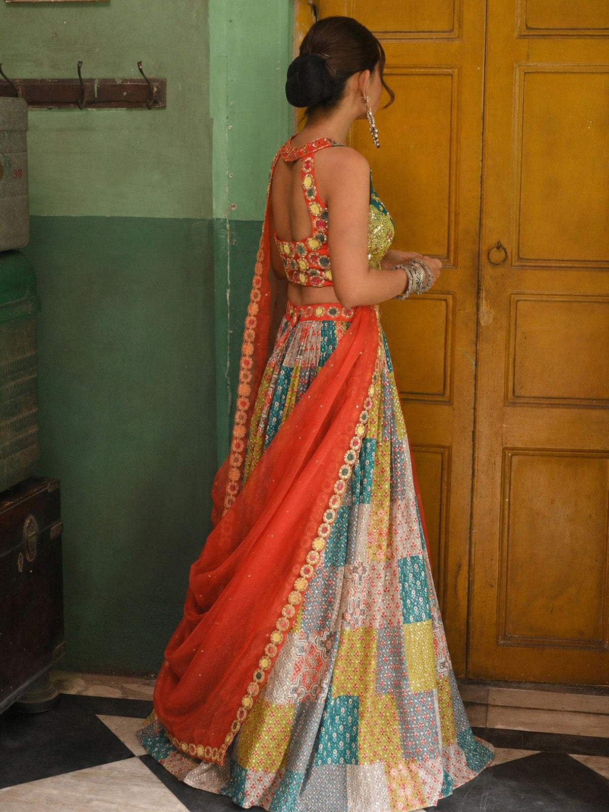 Get the best lehenga for Navratri, Garba and Dandiya featuring multicolor print, 4.25m flair, embroidered blouse, Organza dupatta and handmade tassels.