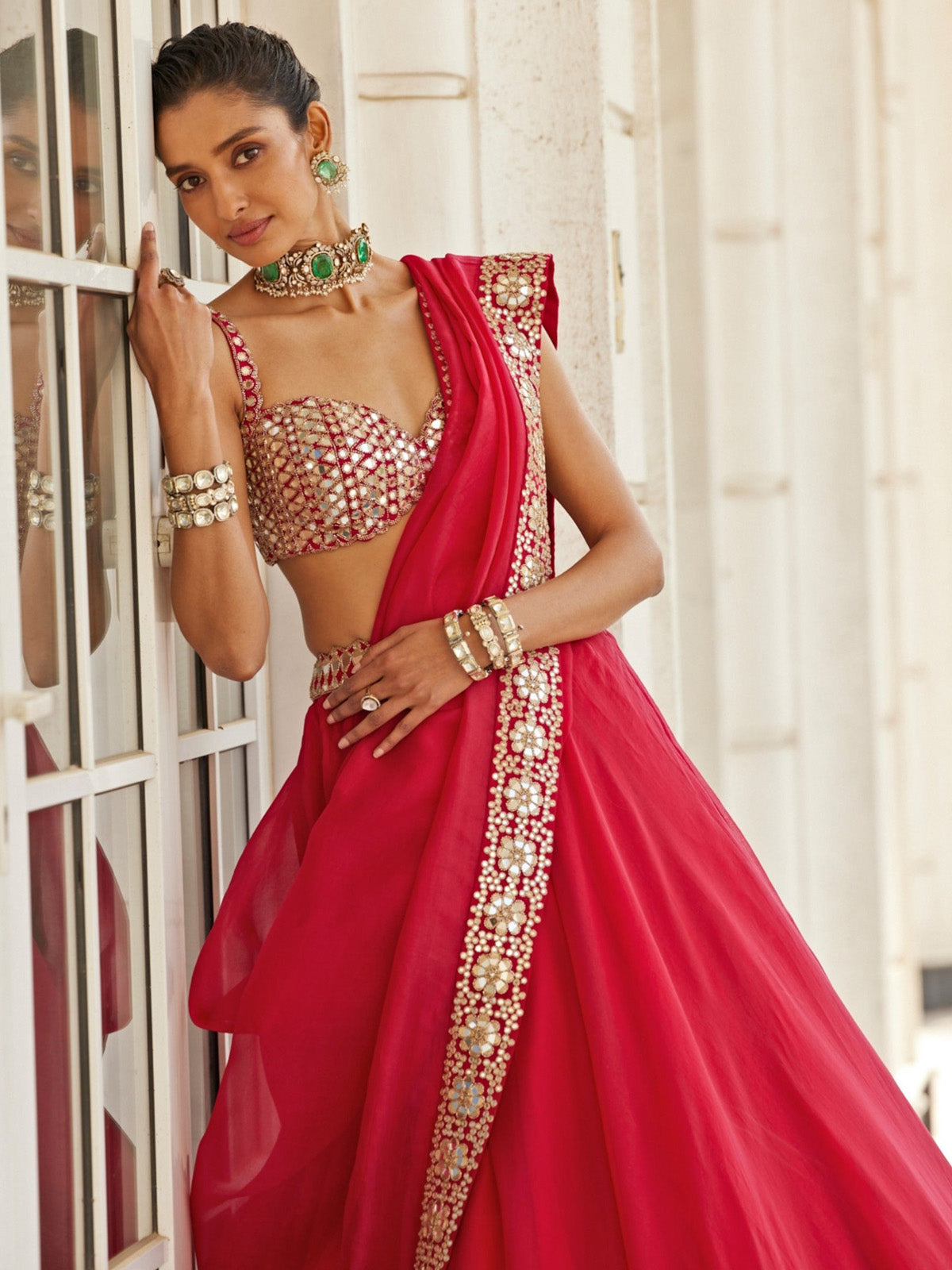 Discover a stunning wedding lehenga choli with Organza Silk, 5MM sequin mirror work, 4.20m grand flare, embroidered blouse and matching dupatta.