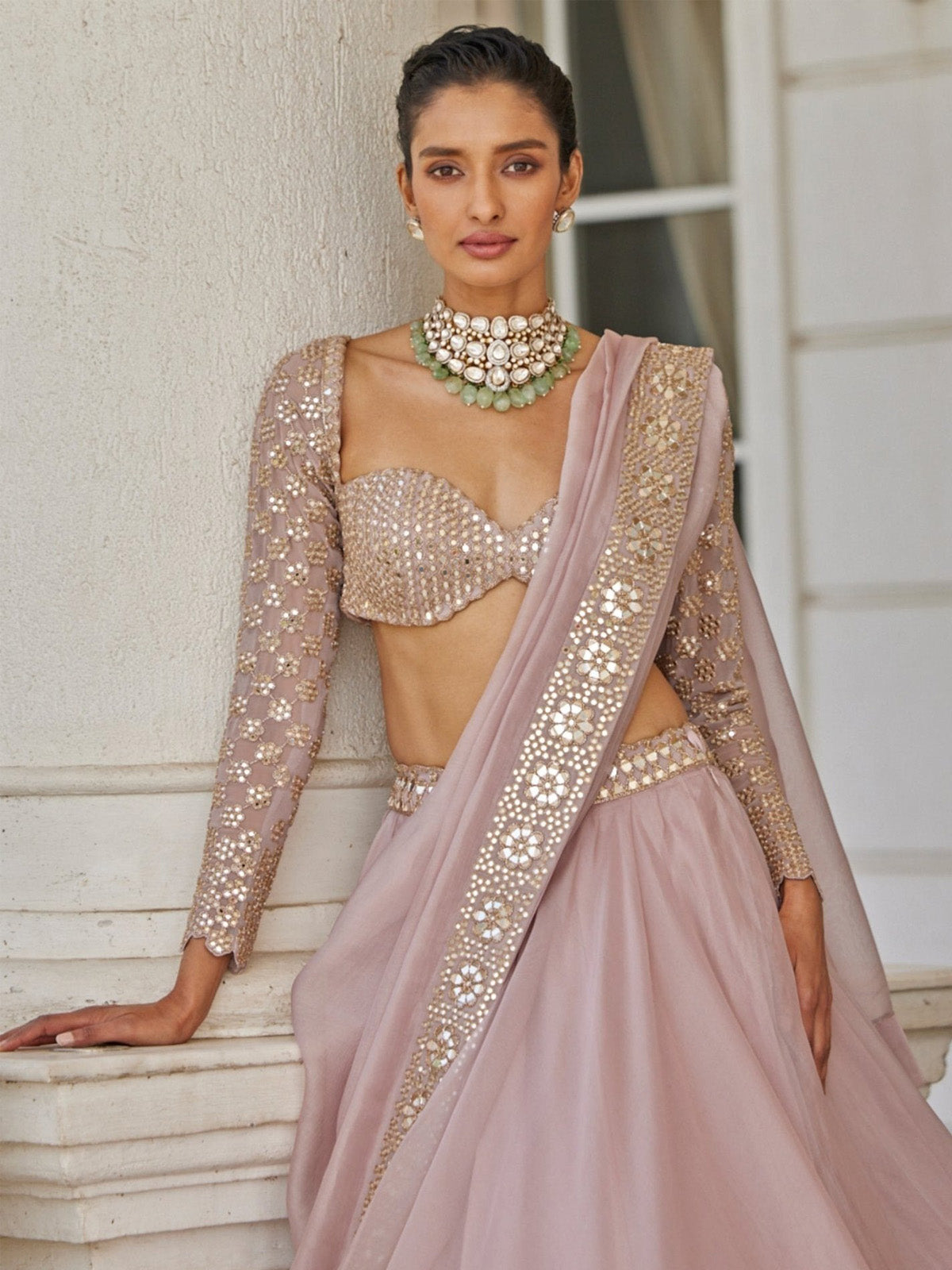 Discover a stunning wedding lehenga choli with Organza Silk, 5MM sequin mirror work, 4.20m grand flare, 9MM embroidered blouse and matching dupatta.