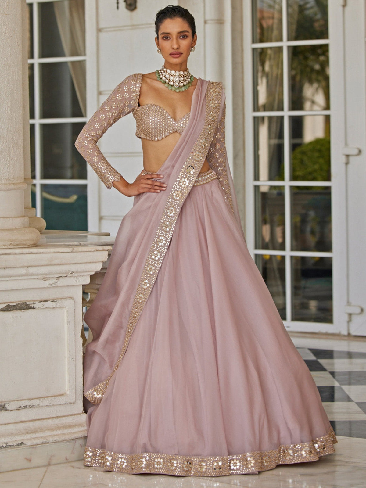 Buy a luxury silk lehenga for women featuring paper mirror, sequin and zari embroidery, cancan, canvas, customizable blouse and stitched Organza dupatta.