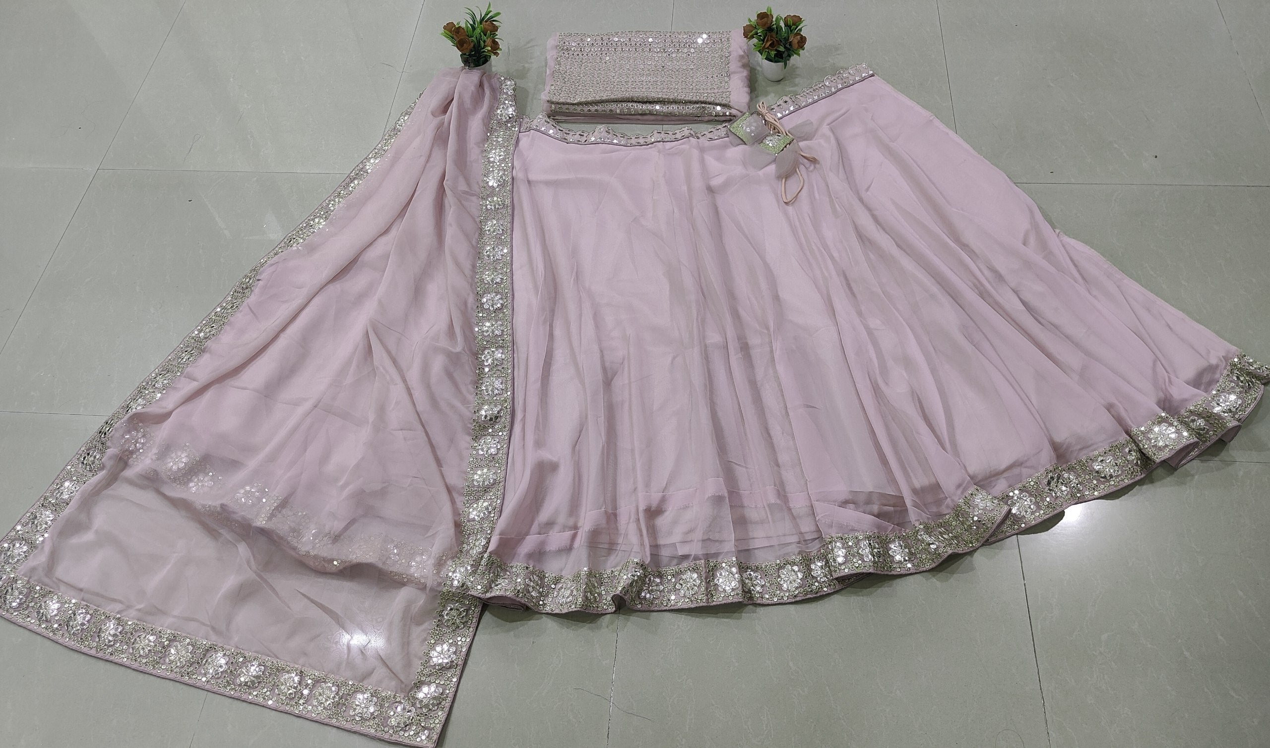 Find the best wedding lehenga with Organza Silk, 5MM sequins, paper mirror work, grand 4.20m flare, embroidered blouse and elegant stitched dupatta.