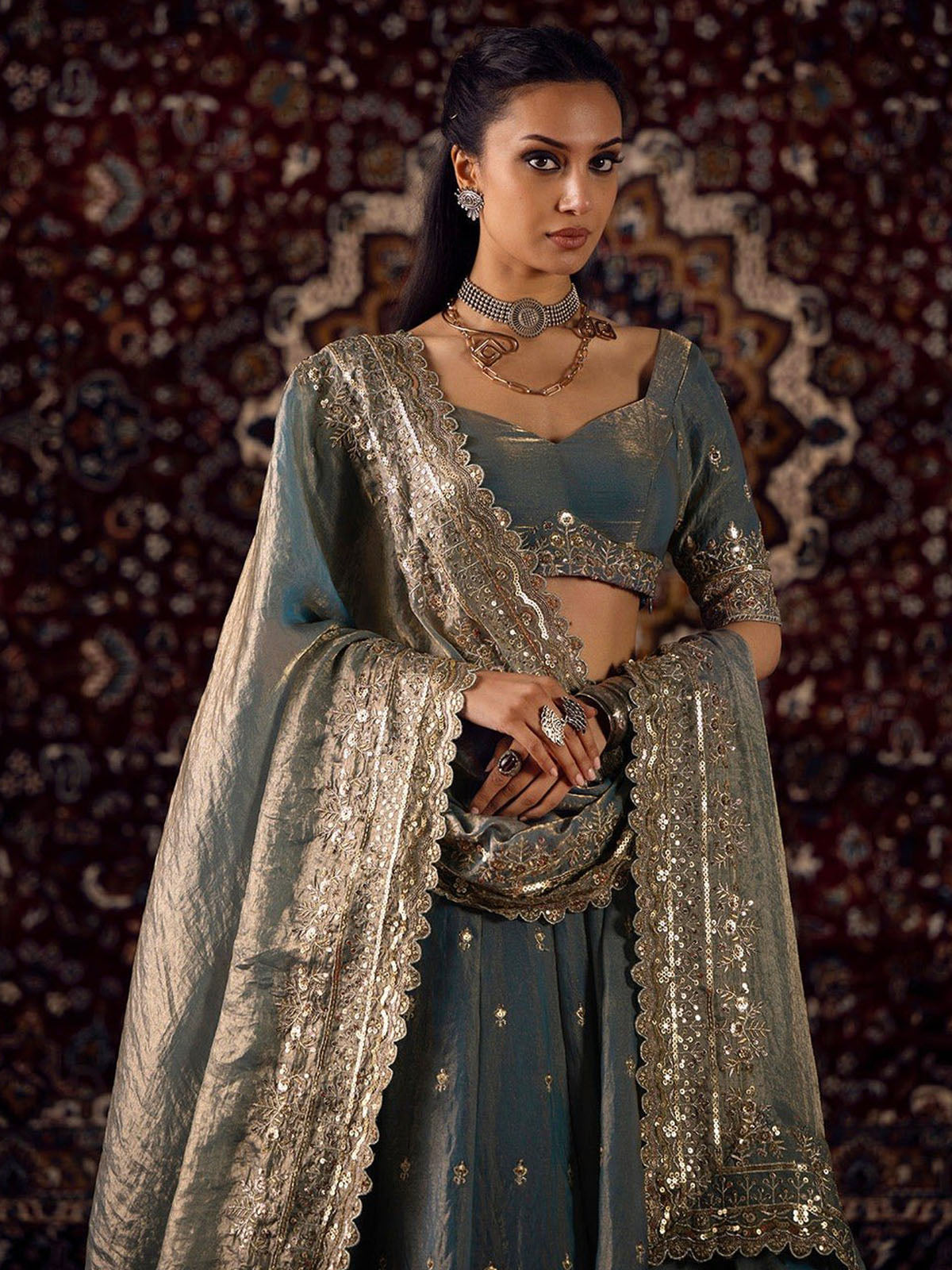 Find a beautiful wedding lehenga choli set for women and girls with Zari, 5MM & 3MM sequin embroidery and a luxurious dusty blue finish.