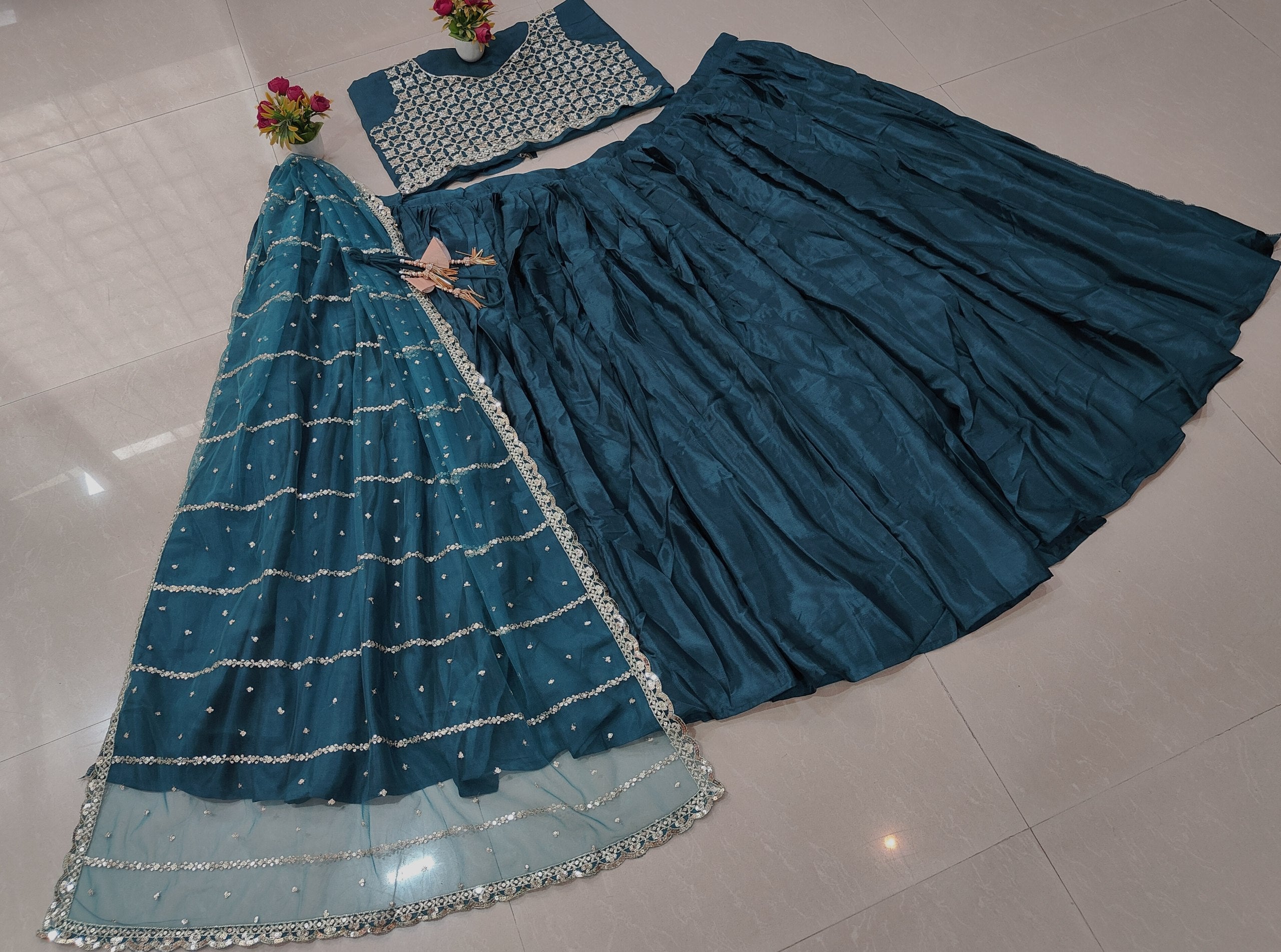 Find the best lehenga for women and girls for weddings and festive events, featuring Chinon Silk, Zari embroidery, sequins and a dramatic 5.80M flair.