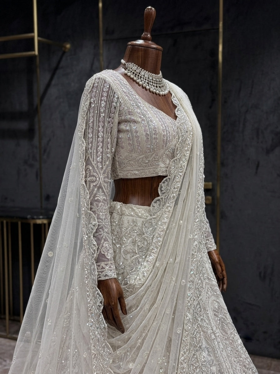 Choose FEALDEAL for a glamorous women lehenga choli featuring Butterfly Net, embroidery sequins, 4m flare and customizable 1.3m unstitched blouse fabric.