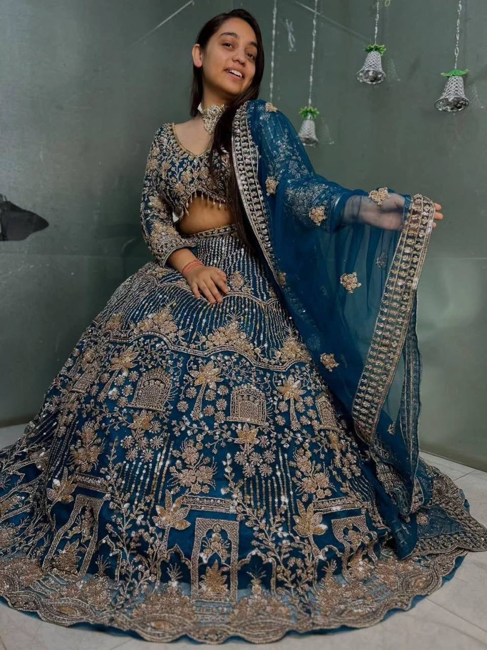 Make a statement in this premium soft net wedding lehenga choli with coding sequins work, 4m flare and matching dupatta. Ideal for festive celebrations.