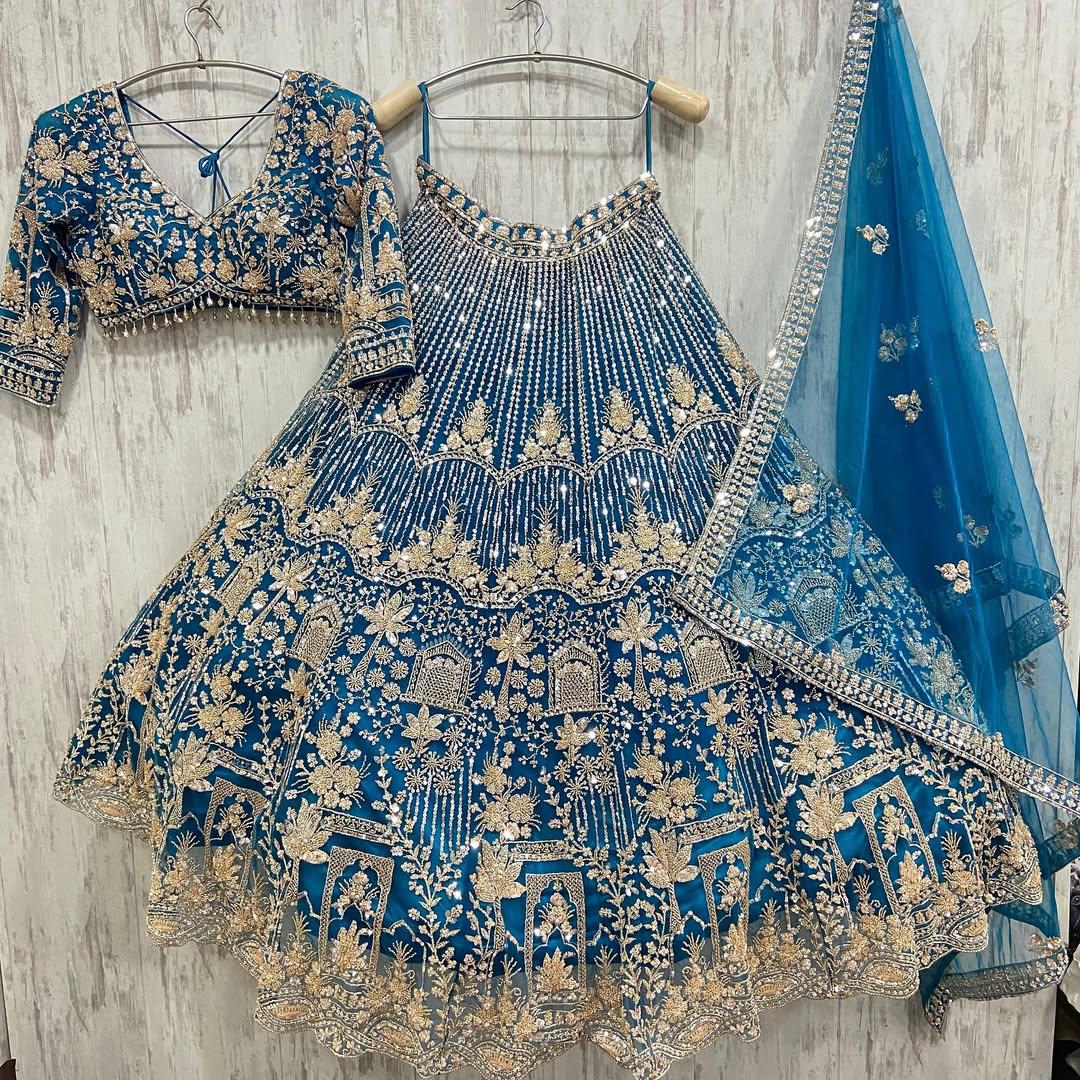 A stunning lehenga choli set for wedding, sangeet and festive occasions. Premium soft net, coding sequins, 4m flare and 2.3m matching dupatta included.