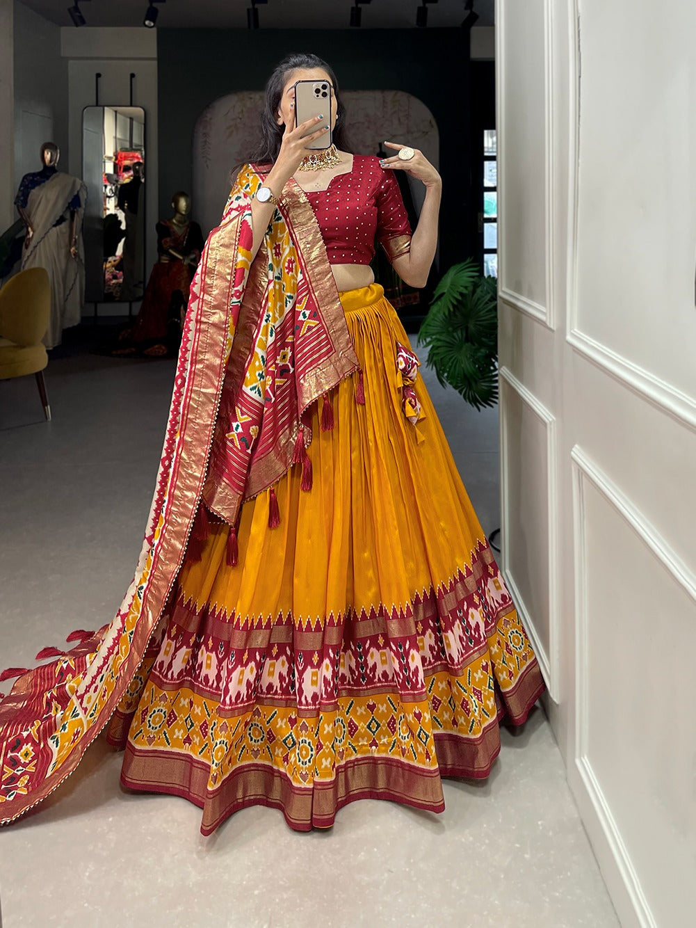 Woman in a traditional yellow and red chaniya choli for wedding,
cotton chaniya choli for navratri,
rajasthani chaniya choli,
chaniya choli song download,
surat chaniya choli wholesale market,
simple chaniya choli for navratri,
gujrati chaniya choli,