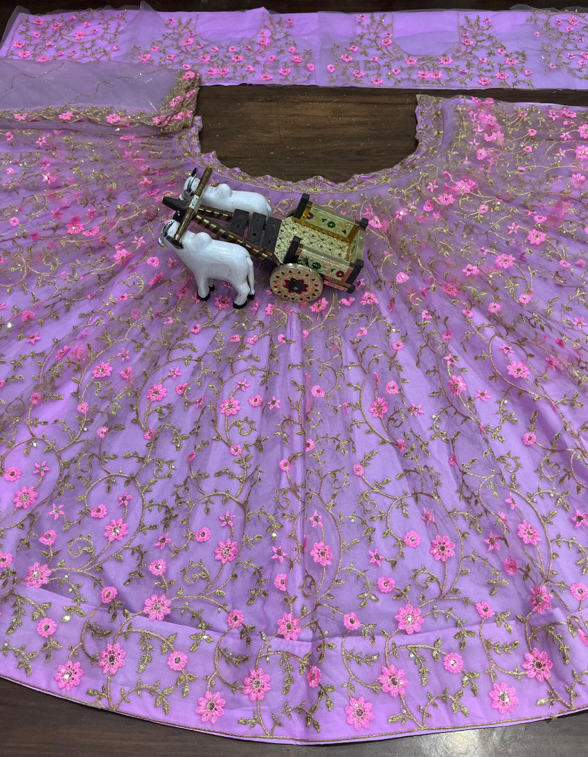 Elegant embroidered lehenga choli dress in soft net with dupatta. Best lehenga for weddings, receptions & festivals for women & girls.