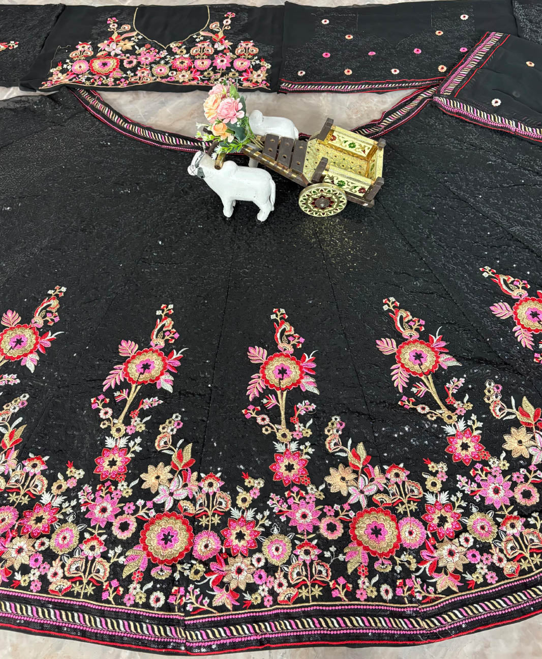 Shop online for women lehenga choli in Faux Georgette with sequins work. Affordable wedding lehenga choli & stylish girls lehenga with dupatta.