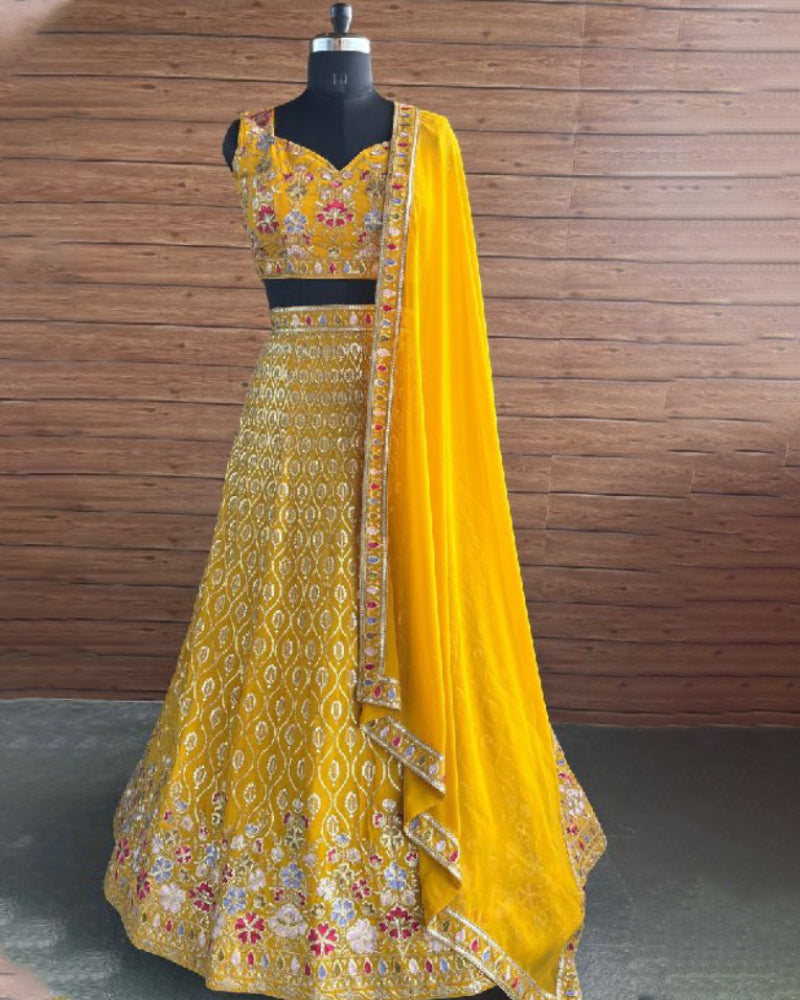 Elegant wedding lehenga for women in faux georgette with intricate thread and sequin embroidery for a perfect bridal look.