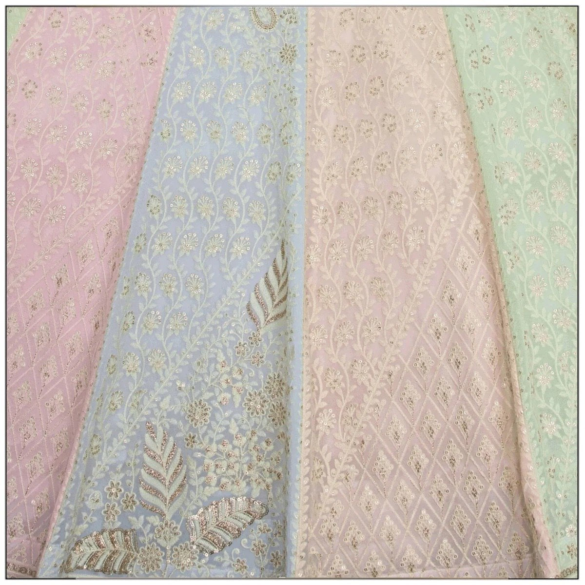 Traditional Indian wedding lehenga for women with pink, red, and green tones | FEALDEAL lehenga choli for weddings and festive occasions – Surat craftsmanship