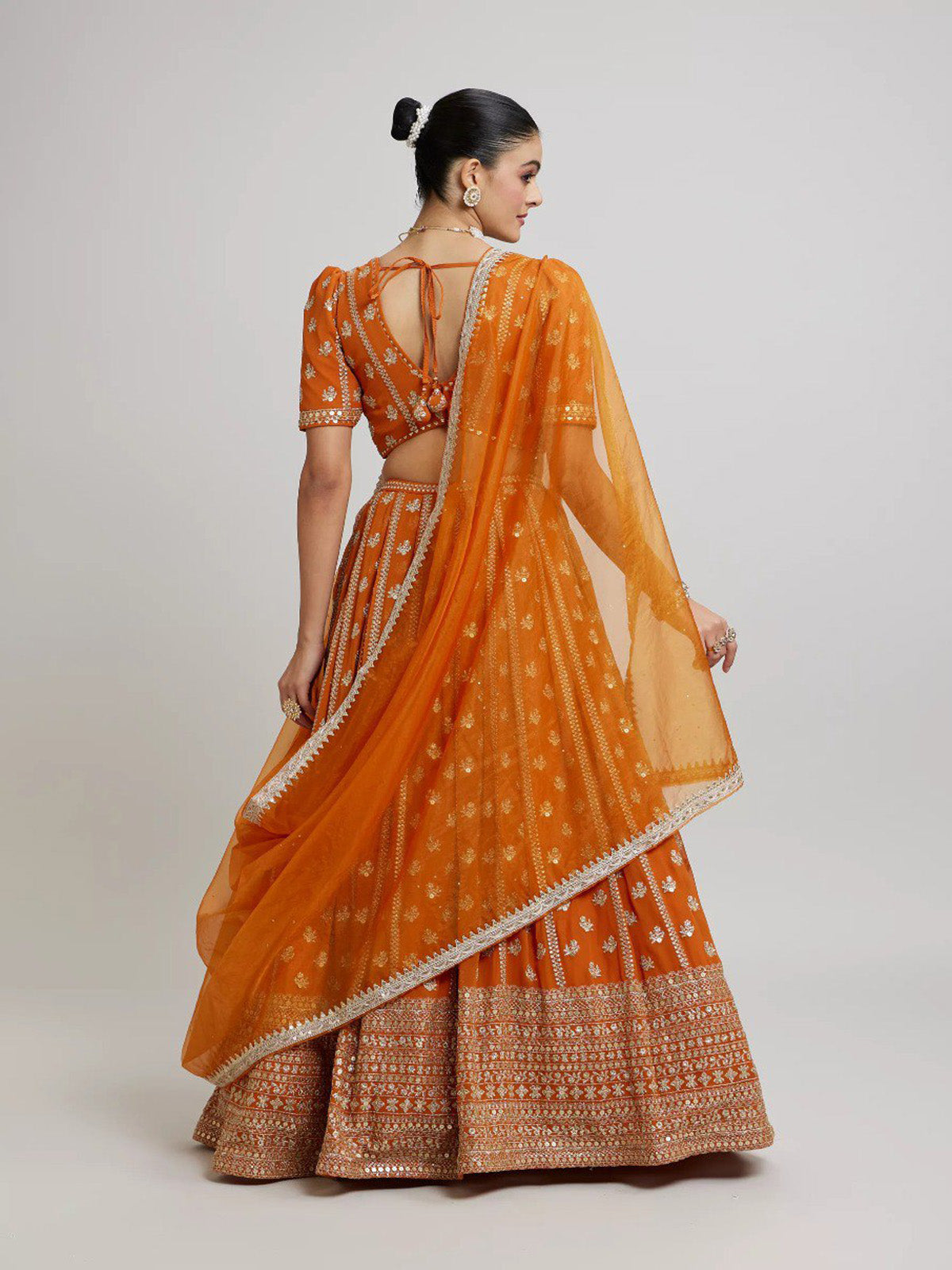 Premium orange sequin lehenga choli with faux georgette fabric, zari embroidery and coding dori border dupatta. Ideal for women and girls.