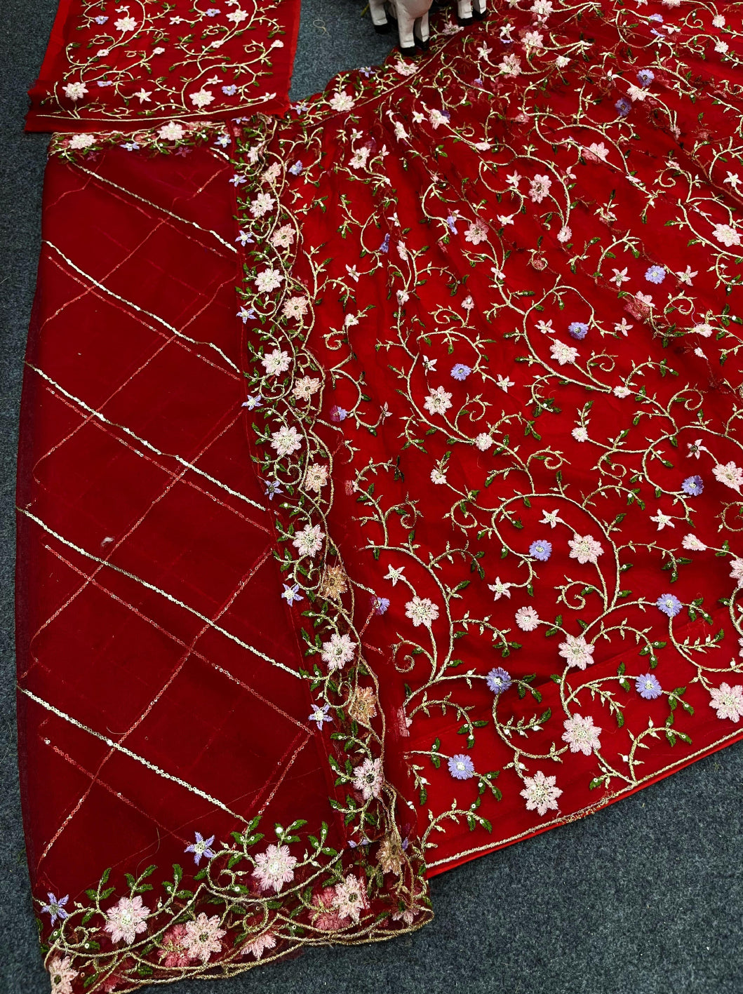 Red color soft net embroidered lehenga choli for women
