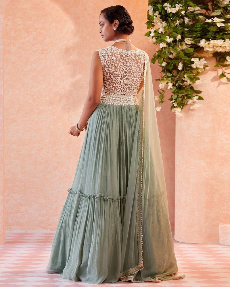 Lehenga choli with long skirt, Lehenga choli for sangeet, Lehenga dupatta, Velvet lehenga, Lehenga with mirror work, Lehenga with stone embellishments, Lehenga with patchwork, Lehenga with thread embroidery, Indian traditional attire, Ethnic wear, Lehenga choli with gota patti work, Lehenga choli with bandhani print