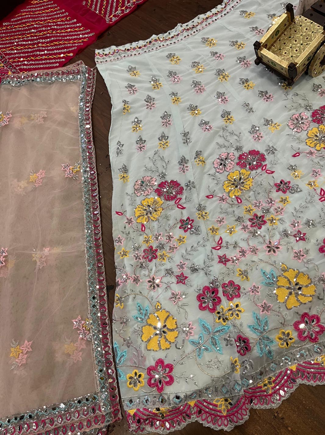 Premium fox georgette lehenga choli dress with butterfly net dupatta. Ideal lehenga for women weddings, festive occasions & cultural events.