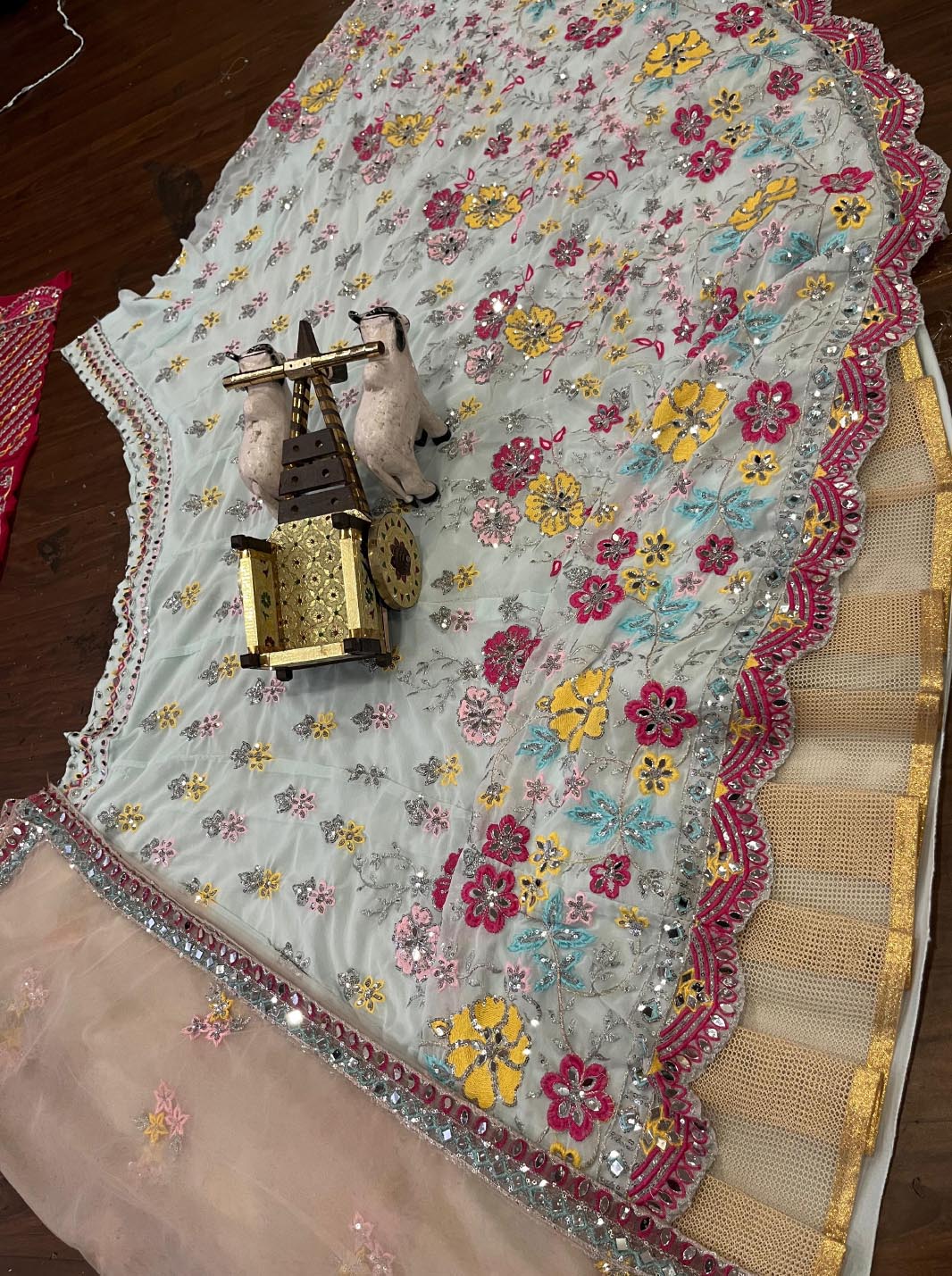 Elegant embroidered lehenga choli for girls & women in georgette fabric. Semi-stitched lehenga with dupatta, perfect for weddings & parties.