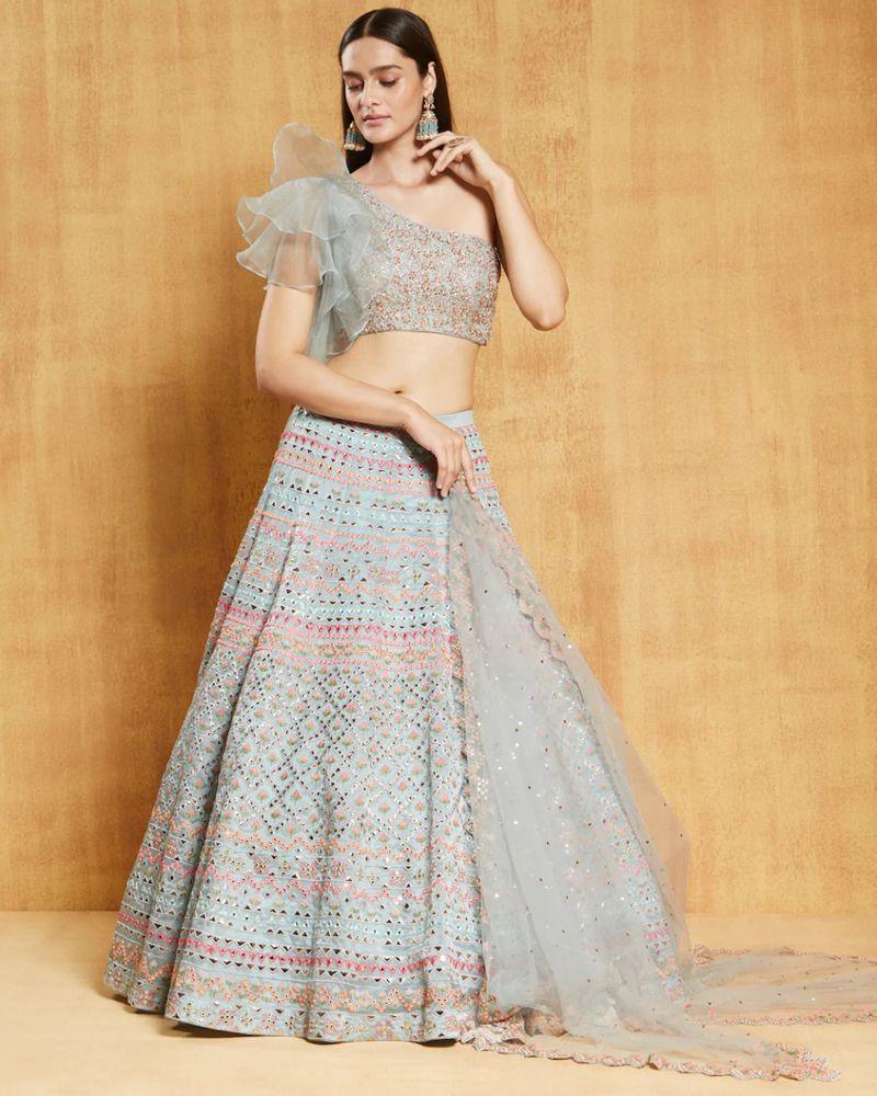 Lehenga choli with dori work, Lehenga choli in sunny yellow, Lehenga choli for spring wedding, Lehenga choli with wrap blouse, Lehenga choli for date night, Lehenga choli in royal attire, Lehenga choli with beaded fringe, Lehenga choli for afternoon tea, Lehenga choli with criss-cross back, Lehenga choli in wine color