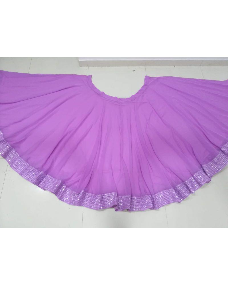 Cape style Lehenga choli, Lehenga choli in dark shades, Handloom Lehenga choli, Lehenga choli with asymmetrical hem, Lehenga choli for vacation, Lehenga choli with gold foil work, Convertible Lehenga choli, Lehenga choli with halter neck, Mirror embroidered Lehenga choli, Lehenga choli with scalloped edges