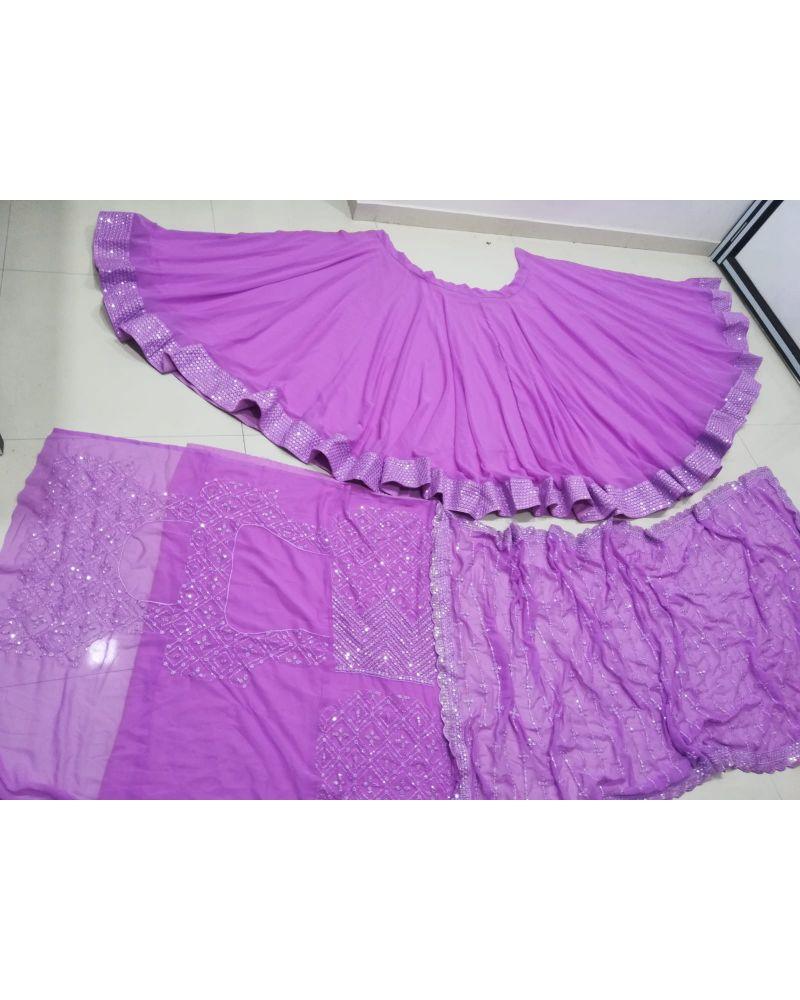 Cape style Lehenga choli, Lehenga choli in dark shades, Handloom Lehenga choli, Lehenga choli with asymmetrical hem, Lehenga choli for vacation, Lehenga choli with gold foil work, Convertible Lehenga choli, Lehenga choli with halter neck, Mirror embroidered Lehenga choli, Lehenga choli with scalloped edges